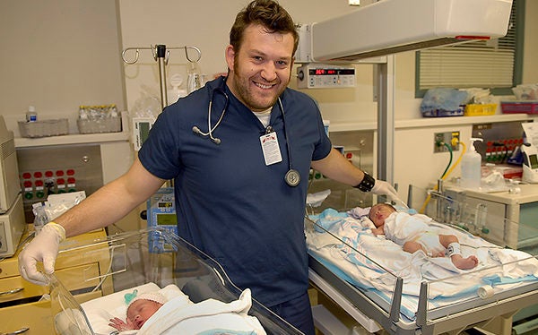 Nurse with neonates