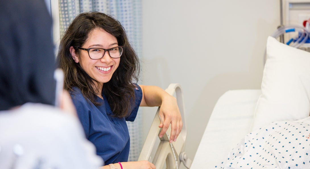 Nurse at patient bedside