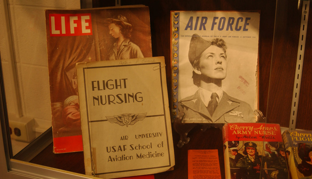 Covers of three publications: a LIFE Magazine, an Air Force manual, and a manual on flight nursing