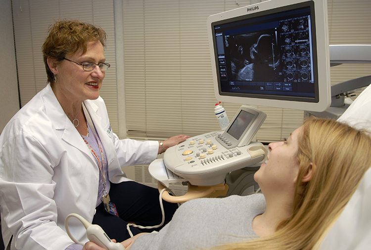 Barbara McFarlin performing ultrasound