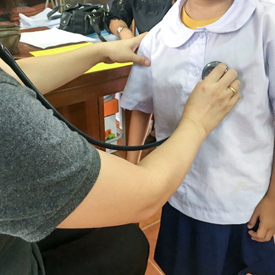 school nurse with patient