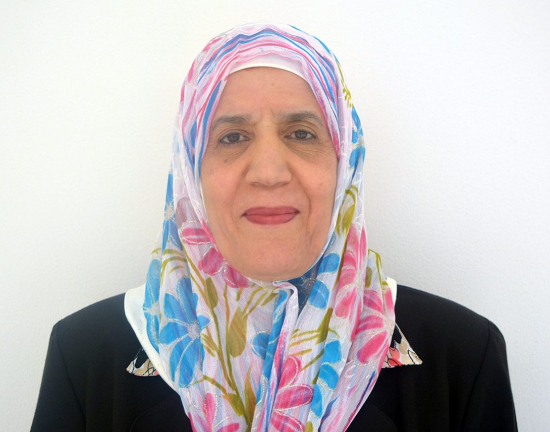 Profile image of woman in head scarf