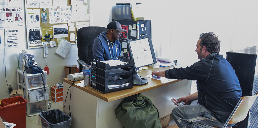 A COIP client meets with a staff member.