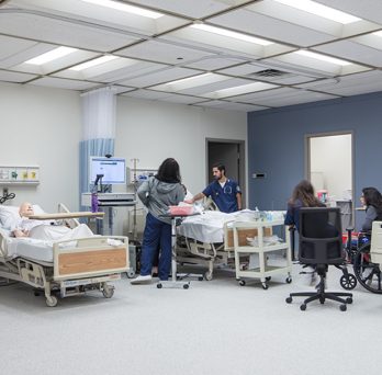 Students work in the UIC College of Nursing-Springfield Campus’ expansive simulation laboratory.
                  