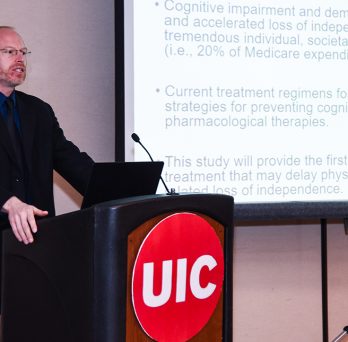 Ulf Bronas, speaking at the college's 2019 Research Day
                  