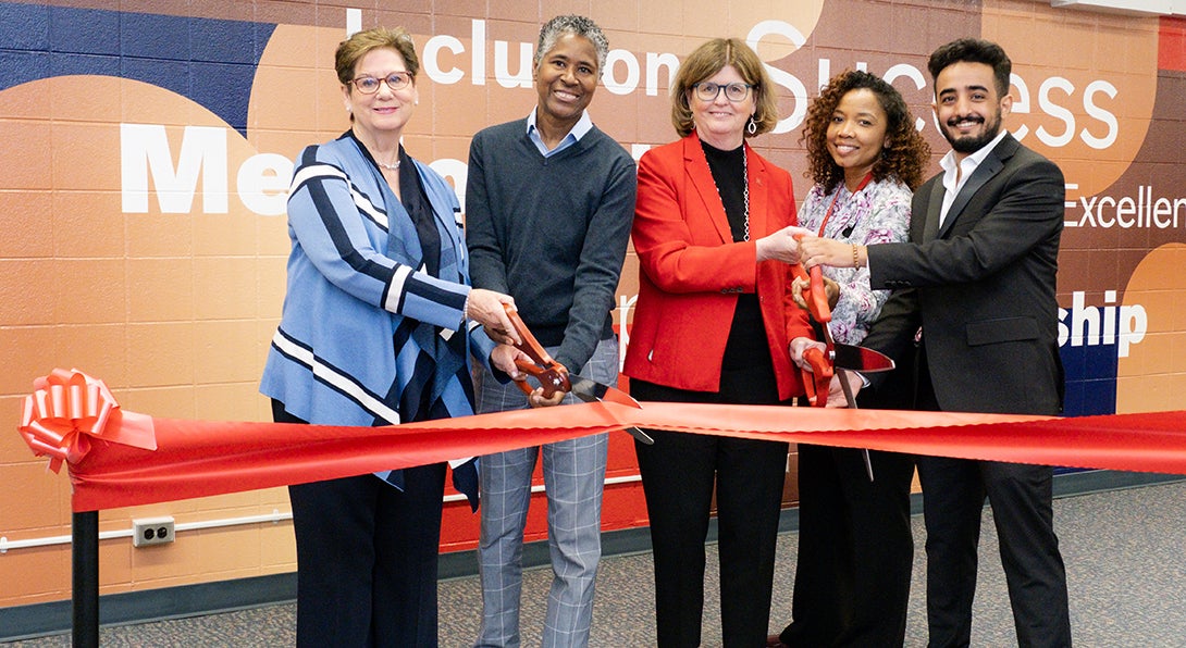 Cutting the ceremonial ribbon