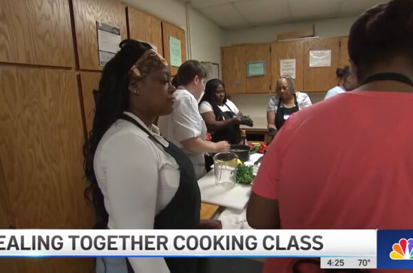 Screen capture of women in cooking class