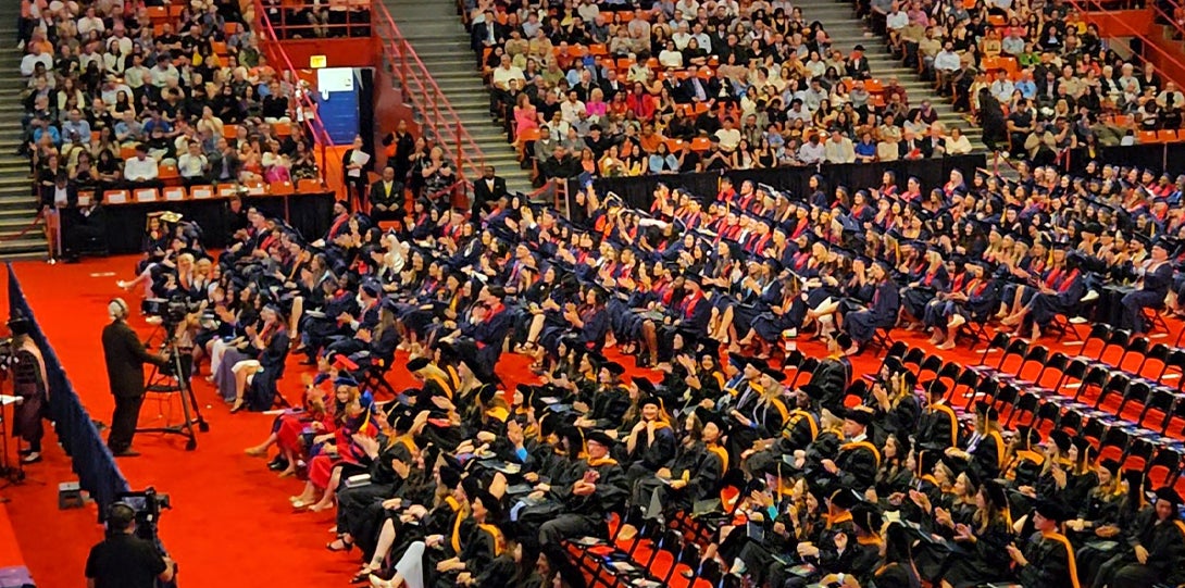 Large audience of graduates and supporters fill the arena